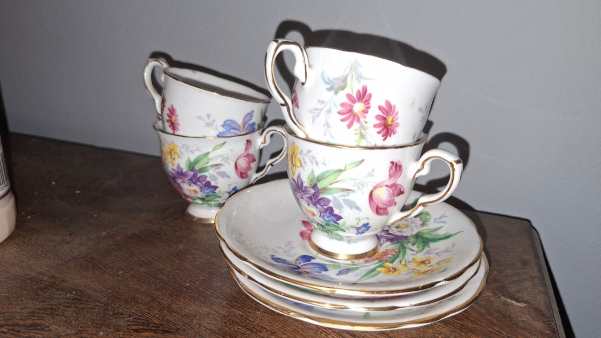Royal Stafford Floralia tea set with four cups and three saucers