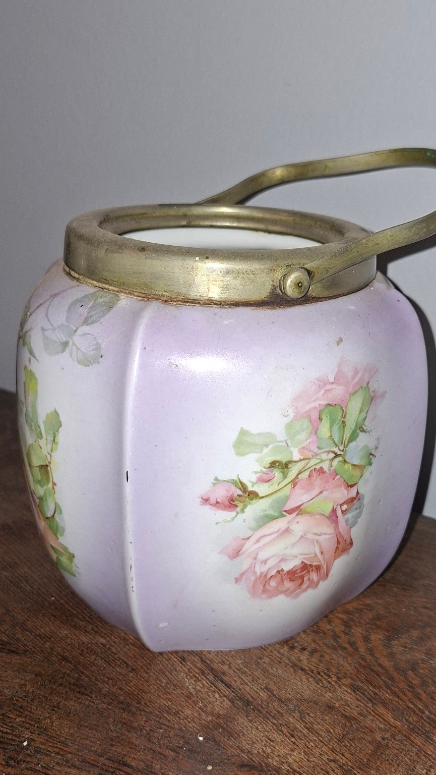 Vintage floral porcelain biscuit jar with metal lid and swing handle
